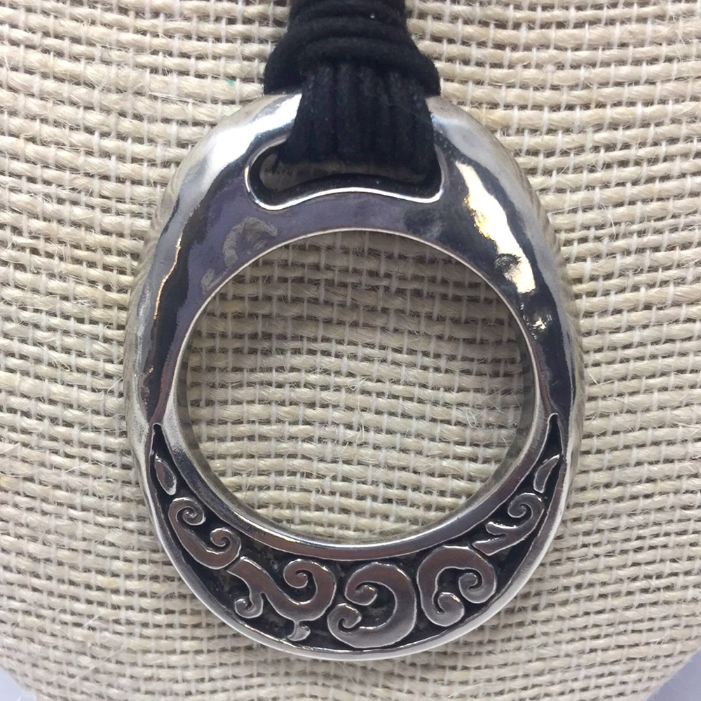 Brighton necklace pendant on cords in silver tone